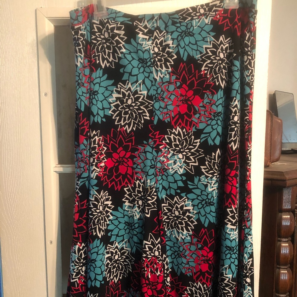 Multiple colors of red, white, turquoise & black
